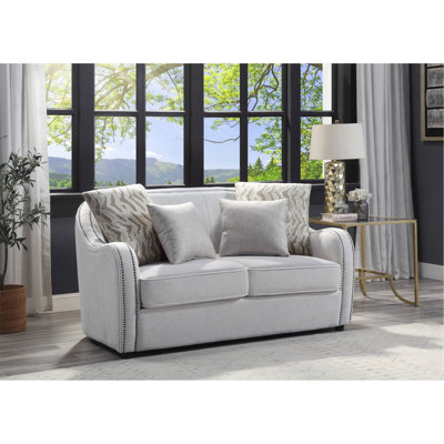 Causeuse en lin beige avec 4 coussins