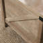 Table basse à plateau relevable, finition brune