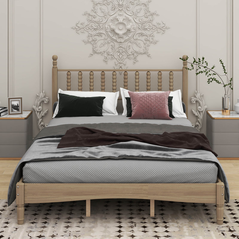 Grand lit plateforme en bois avec tête de lit en forme de gourde