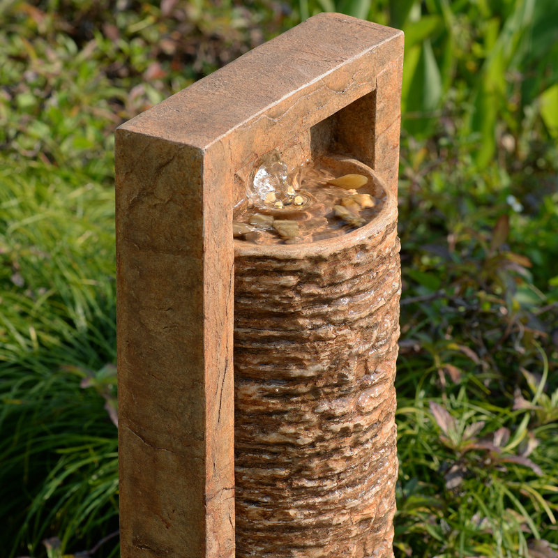 Framed Layered Rock Design Patio Water Fountain With Warm Glow Lighting, Brown