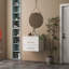 Le meuble-lavabo mural 24 po avec deux tiroirs, système de fermeture en douceur, lavabo en céramique, crée un espace de salle de bain moderne et minimaliste