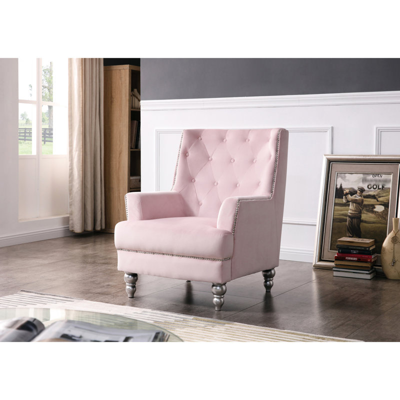 Charmant fauteuil traditionnel à accoudoirs ronds
