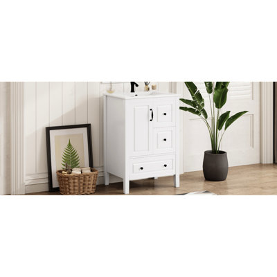 Meuble-lavabo blanc de 24 pouces avec lavabo en céramique intégré, rangement à fermeture en douceur et tiroirs, dossier ouvert pour faciliter la plomberie