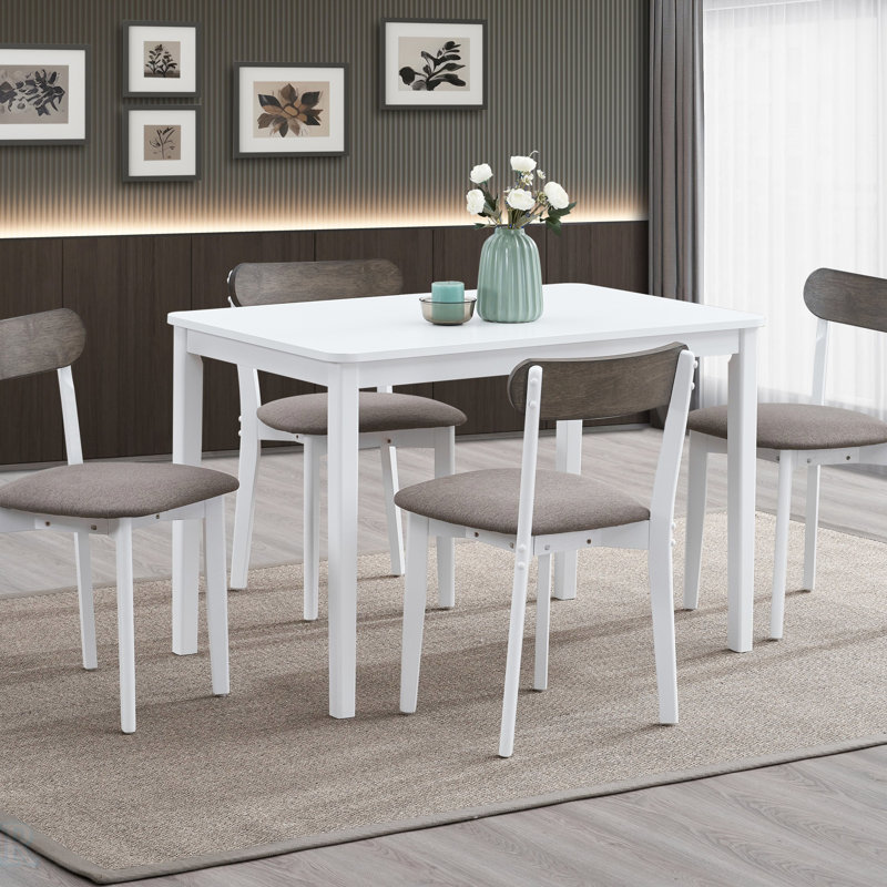 Ensemble de salle à manger 5 pièces avec chaises confortables et table rectangulaire, parfait pour les repas de famille et les rassemblements.