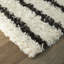 Tapis noir / ivoire Donaciones-1935501539