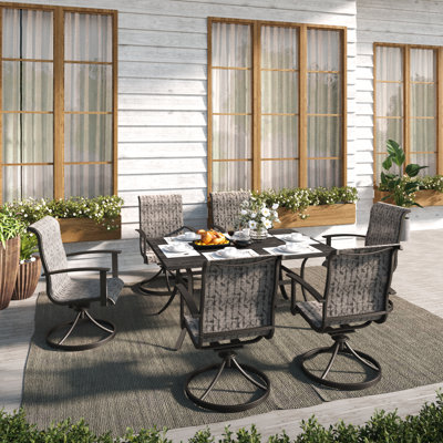Errik Rectangular 6 - Person 66'' Long Swivel Rocking Dining Set
