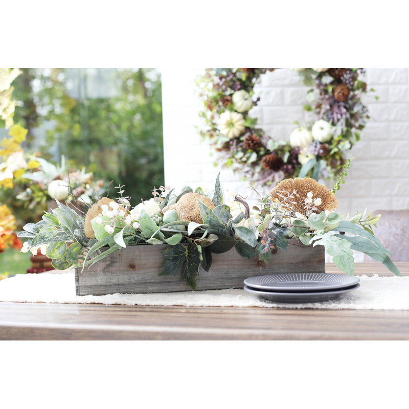 Arrangement floral dans un pot de fleurs