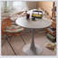 Table de salle à manger ronde blanche moderne avec plateau en panneau de fibres à densité moyenne et base en acier, idéale pour les petits espaces et la vie contemporaine-707798837-707798986-707798833