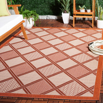 Arneshia Geometric Cream/Terracotta Indoor/Outdoor Area Rug