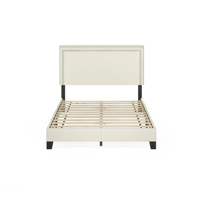Carlester Upholstered Slat Bed