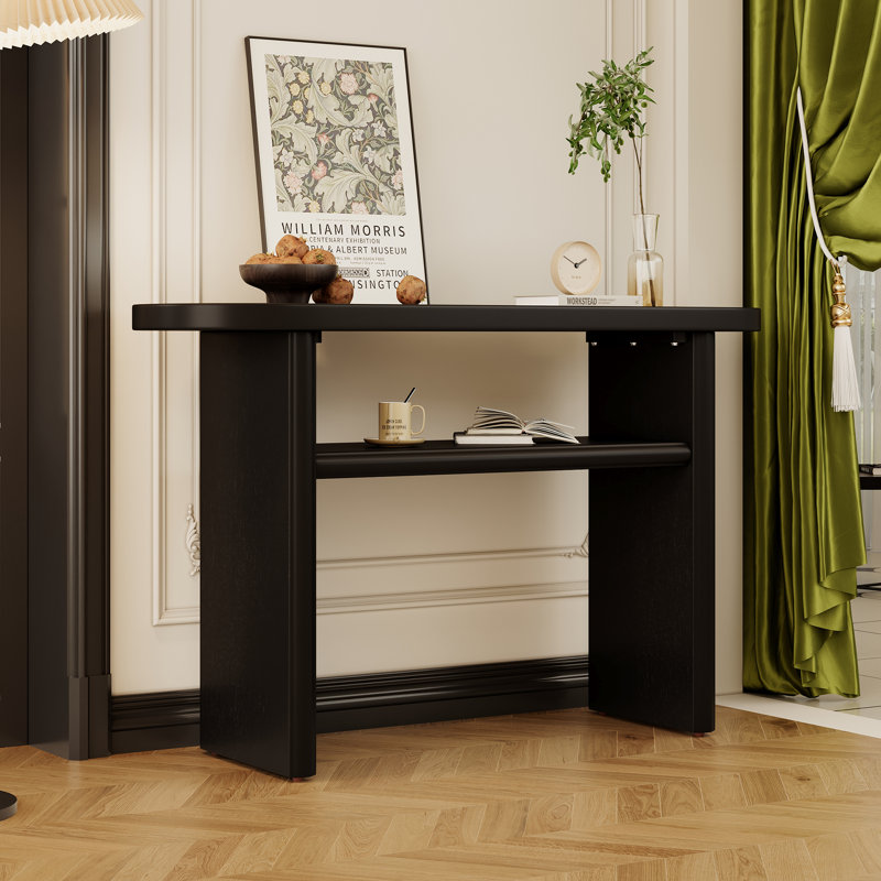 Console minimaliste avec bords arrondis et tablette robuste, alliant élégance et durabilité pour tout espace, Noir