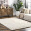 Tapis à poil long en laine Nemya-89723705