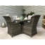 Cadmose 4 - Person Wicker Patio Dining Set with Round Table , Cushions Included