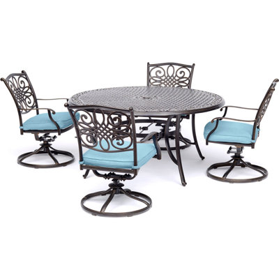 Carleton 4 - Person Patio Dining Set with Round Table , Cushions Included