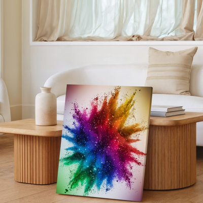 Toile, une éclatante explosion de couleurs irradie du centre, mettant en vedette un mélange dynamique de rouges, d'oranges, de jaunes et de bleus sur toile
