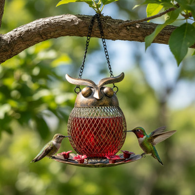 Mangeoire pour oiseaux en fonte brune en forme de hibou