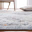 Tapis gris et beige à motif géométrique-143984127