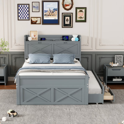 Lit en bois avec tête de lit et prises de rangement, lit extensible avec lit gigogne et tiroirs de rangement multiples pour un espace de vie amélioré