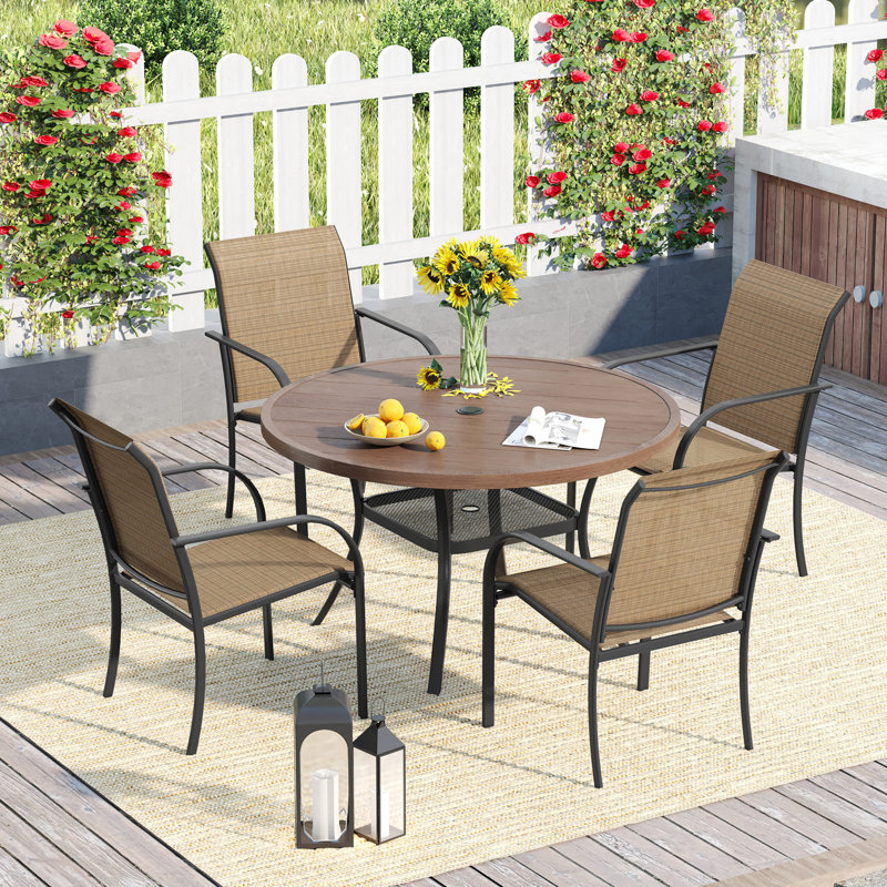 Round 4 - Person Outdoor Dining Set with 4 Stackable PVC-coated polyester Armrest Chairs, Brush Wood Brown/Brown