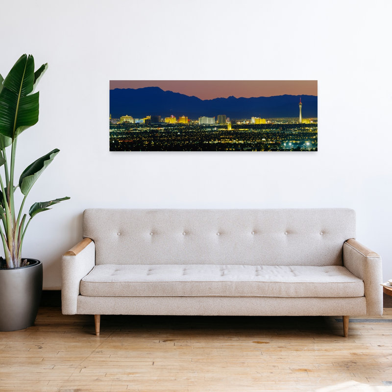 Aerial View Of Buildings Lit Up At Dusk Las Vegas Nevada USA by Richard Sisk - Wrapped Canvas Panoramic Print