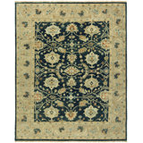 Preece Wool Oriental Area Rug in Blue