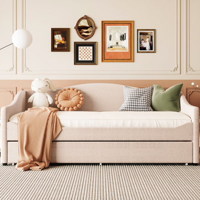 Upholstered Daybed With Beige Fleece And Twin Size Slide-Out Trundle Frame Sliding
