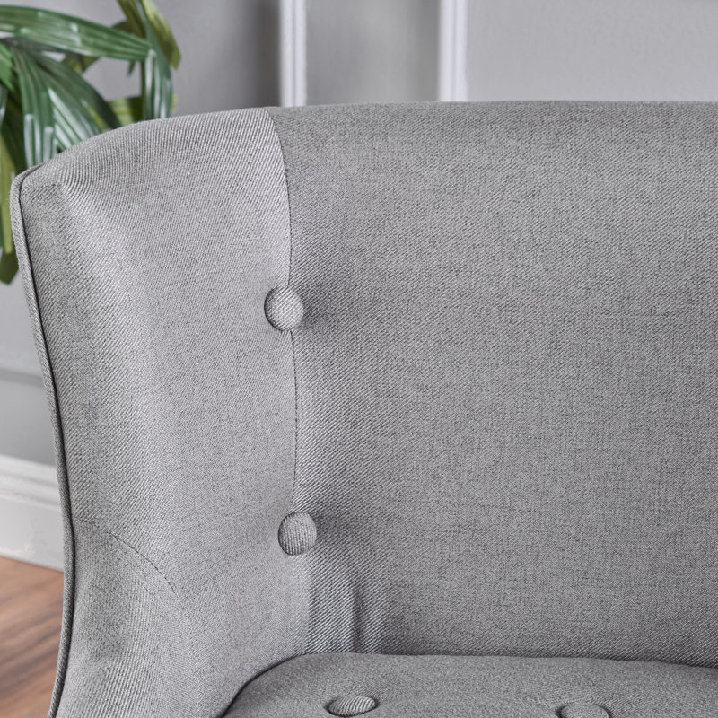 Fauteuil à oreilles capitonné Staas, 100% polyester gris
