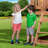 Backyard Discovery Scenic Heights Cedar Wooden Elevated Kids Playhouse with Play Kitchen, Deck, and Toy Storage Bench