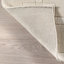Tapis en laine mélangée à bordure Rune-92279232