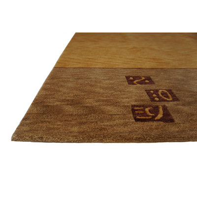 Plateau Hand Knotted Wool Area Rug in Brown/Red