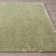 Tapis uni en polypropylène tissé à la machine en vert clair