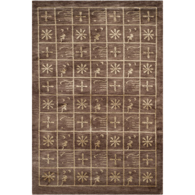 Tibetan Plum Pictogram Brown Area Rug