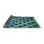 Tapis bleu sarcelle à motif géométrique-307288987