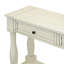 Console avec tiroirs et tablette, derrière le canapé-555199044