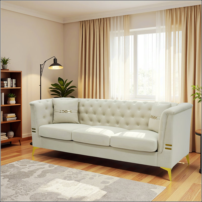 Luxueux canapé de style Chesterfield en velours 3 places avec coussins, pour les salons modernes et élégants., Crème / blanc