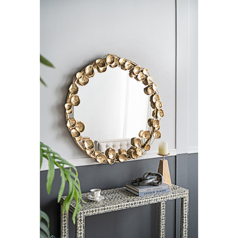Miroir mural rond en métal avec accents dorés, miroir moderne