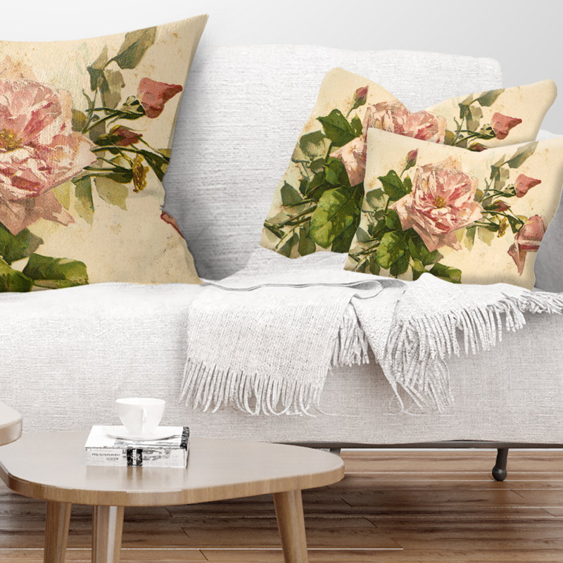 Coussin décoratif à imprimé floral rose