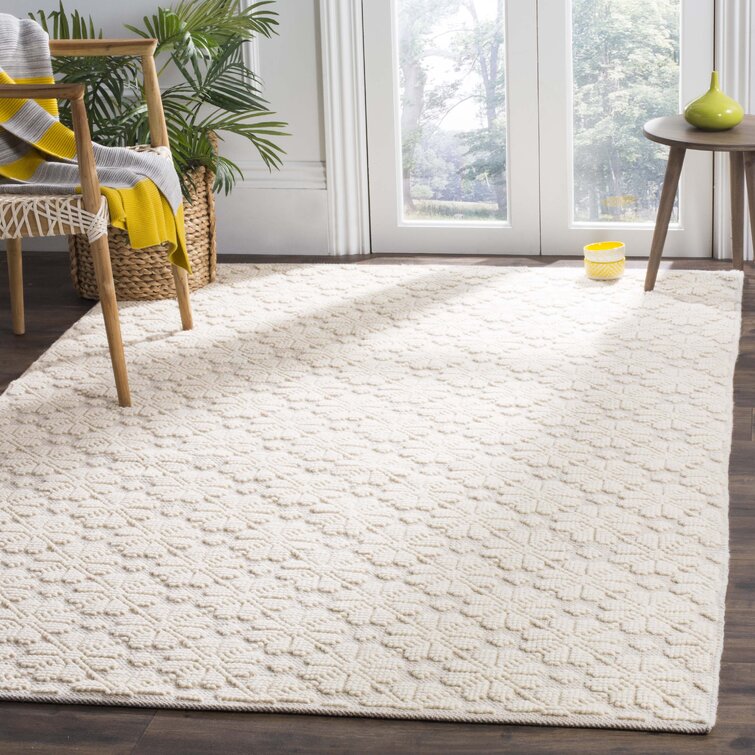 https://assets.wfcdn.com/im/23581426/resize-h755-w755%5Ecompr-r85/4383/43832900/Handmade+Ivory+Rug.jpg