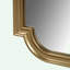 Miroir mural festonné en bois