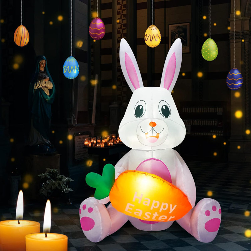 Lapin de Pâques tenant une carotte gonflable