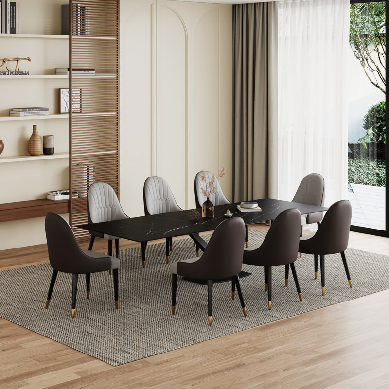 Ensemble de table de salle à manger Terrile avec plateau en pierre frittée extensible 94,5 po et 8 chaises en similicuir