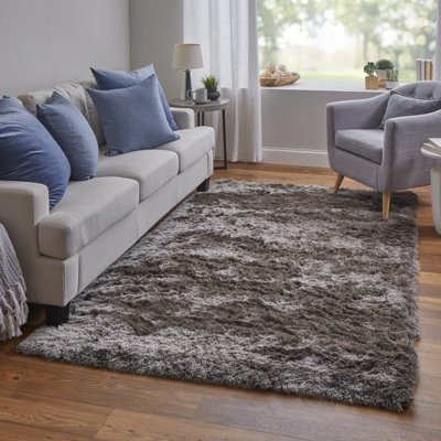 Tapis gris touffeté à la main