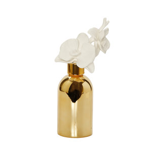 Diffuseur de bouteille d'or avec bouchon doré et fleur blanche, "English Pear & Freesia"