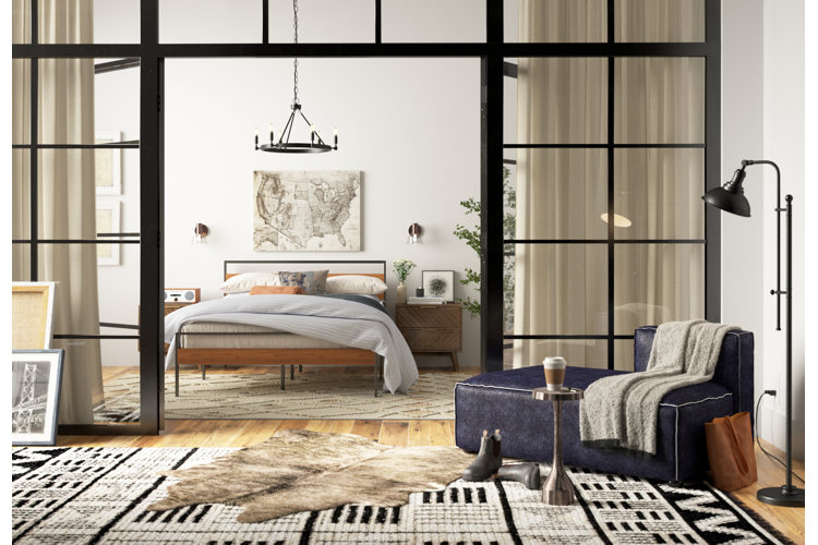 industrial loft with an open floor plan bedroom and living room