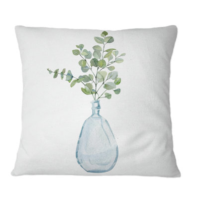 Plantes d'intérieur dans un vase en verre, branches d'eucalyptus - coussin décoratif traditionnel