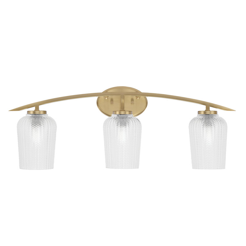 Barre d'éclairage de salle de bain 3 lumières avec verre texturé 5 po Kurve, Clair, Laiton