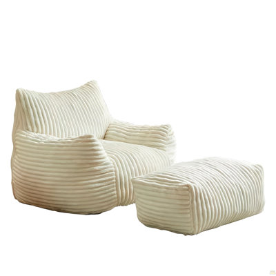 Canapé en suède avec repose-pieds
