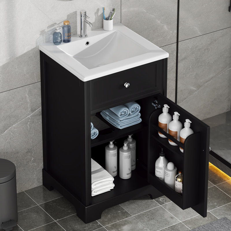 Meuble-lavabo noir de 50 cm avec lavabo, fini peint, tablette de rangement et poignée ronde. Porte d'armoire de 50 cm avec tablette réglable.