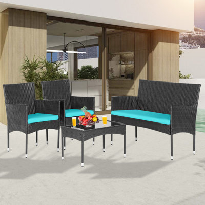 Ensemble de 4 meubles de patio Ensemble de bistro en osier Ensemble de conversation d'extérieur résistant aux intempéries avec coussin 3 chaises en rotin et table basse à plateau en verre pour café