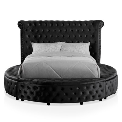 Deskins Upholstered Wingback Bed